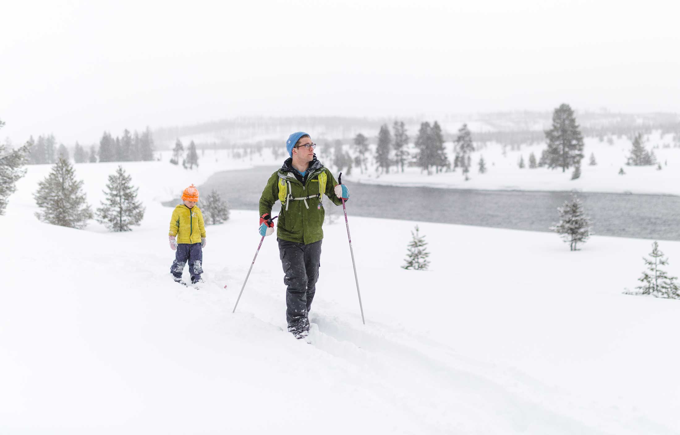 Father and son cross country skiing